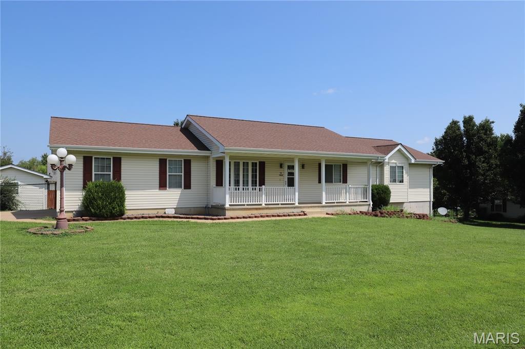 Space, flexibility, and a great Hunters Ridge location! This 3-bedroom, 3-bath ranch offers over 2,100 sq. ft. of living space with an open, inviting layout and hardwood flooring throughout the main living areas. All three bedrooms are conveniently located on the main level, along with two full baths and main-floor laundry.
Downstairs, the partially finished walkout basement adds even more room to spread out, featuring a spacious 28x24 family room and a third full bathroom. Perfect for movie nights, a game room, home office, gym, or entertaining space.
Outside, enjoy the privacy of a newly fenced backyard, a deck replaced in 2024, and two outbuildings offering excellent storage or workshop space. Situated on a corner lot with an attached 2-car garage, this home offers the combination of indoor space, outdoor space, and versatility that's hard to find.