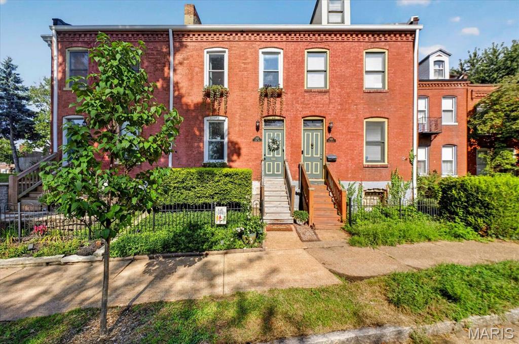 Welcome to 2823 Lemp Ave., a charming, character filled 2 bedroom, 2 bathroom home in the heart of Benton Park, where historic character meets thoughtful modern updates. Just outside your door, enjoy the restaurants, coffee shops, bars, parks, and local favorites that make this one of St. Louis’ most vibrant neighborhoods. Inside, the home offers a comfortable blend of character and functionality. The kitchen and full bathroom were updated in 2020, while second floor laundry and an expanded primary bedroom closet add everyday convenience. Five newer windows bring added comfort, and a 2021 garage addition provides off street parking and additional storage.
A backyard sidewalk provides easy access to the outdoor space, while a brand new roof installed in March 2026 offers added peace of mind. Enjoy nearby Benton Park and Cherokee Park, explore the restaurants and shops along Cherokee Street, and take advantage of the neighborhood’s close proximity to the iconic Anheuser Busch brewery. Full of warmth, personality, and thoughtful updates, 2823 Lemp Ave. offers the opportunity to enjoy all that Benton Park and city living have to offer.