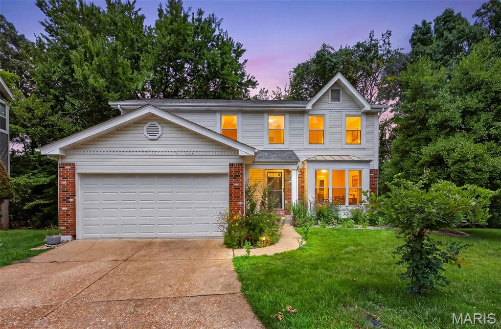 Whether you're hosting family gatherings, enjoying a quiet evening by the fireplace, or relaxing on the deck overlooking the trees, this home offers the lifestyle today's buyers are looking for. Welcome to 1592 Greenfield Crossing Court, 2-story home tucked away on a quiet cul-de-sac in desirable Woodlyn Crossing and Parkway South School District. Backing to wooded common ground, this home offers the perfect combination of privacy and convenience. The open main floor features a spacious living room with bay window, a warm hearth room with wood-burning fireplace, and an adjoining kitchen with breakfast bar, pantry, stainless steel appliances, and main floor laundry. Upstairs you'll find four generously sized bedrooms including a spacious primary suite with walk-in closet and private bath. Since purchasing the home, the sellers have completed numerous updates including new luxury flooring throughout, remodeled half bath, new composite deck, new garage door, drywall improvements, and a brand-new roof (2025). The walk-out lower level with 8-foot pour offers endless possibilities for future finished living space. Enjoy peaceful mornings overlooking the woods or entertain on the spacious deck. Conveniently located near shopping, restaurants, parks, and major highways, this move-in ready home is ready for its next owners.