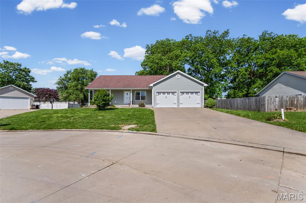 Located on a cul-de-sac in Jerseyville, this well-maintained 3 bedroom, 2 bathroom home offers the perfect blend of comfort and functionality. The open floor plan creates an inviting space for everyday living and entertaining, with sliding glass doors leading out to the patio area. The spacious primary suite features a walk-in closet and private bathroom, while the convenience of main floor laundry adds to the home’s practical layout. Downstairs, the full unfinished basement includes an egress window and bathroom rough-in, offering excellent potential for future living space. Major updates include a BRAND NEW ROOF and NEW FURNACE. Complete with a covered front porch and attached 2-car garage, this home is move-in ready and waiting for its next owner.