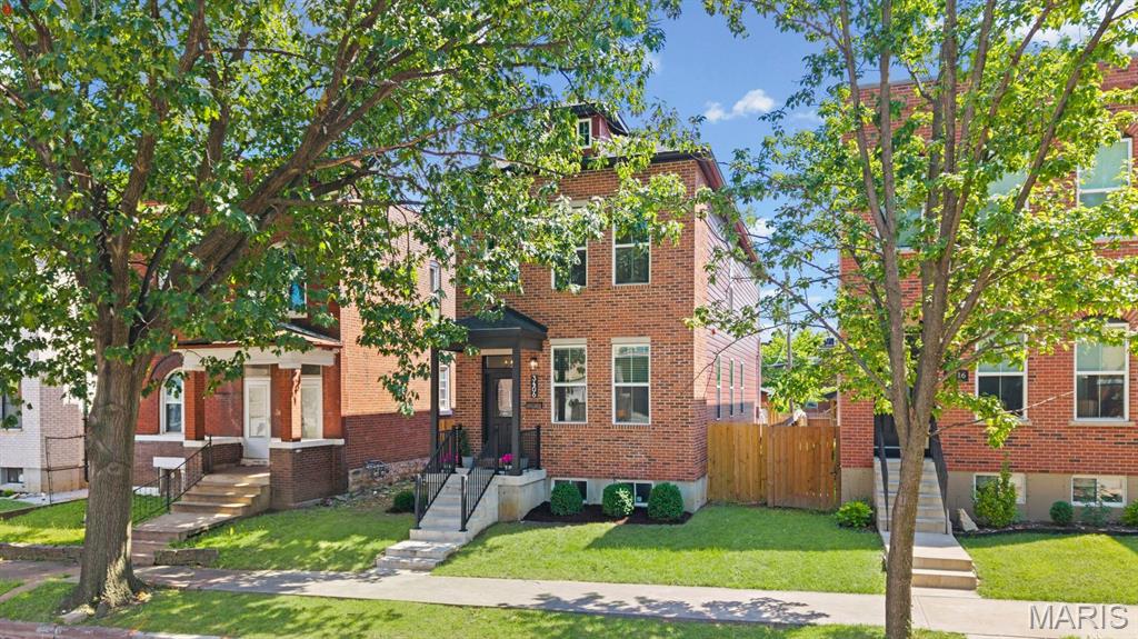 Super clean and modern, this 2023-built home is ideally located near Saint Louis University's Medical Center and between Highways 44 and 64! Stunning curb appeal includes a brick facade, covered entryway, and fresh landscaping. Inside, the bright, open main level features tall ceilings, large windows, hardwood floors, two inviting living spaces, and a crisp white kitchen with a quartz island. Abundant cabinetry, generous counter space, and newer stainless-steel appliances make everyday cooking and entertaining easy!
Upstairs, the primary suite offers a tray ceiling, stylish black-and-white bathroom with dual vanities, separate bathtub and tiled shower, walk-in closet, and private deck. Two additional bedrooms, another tiled full bathroom, and a laundry room complete the second level.
The expansive 9-foot-pour basement is ready for your finishing touches!
Outside, enjoy a two-level deck, private fenced yard perfect for children and pets, and a massive carport offering plenty of covered parking. Low-maintenance and move-in ready with newer systems and finishes throughout! Conveniently located near restaurants, cafés, Starbucks, Target, Topgolf, and more in the Gate District. Best of all. the tax abatement runs through 2036, representing approximately $38,000 in potential property tax savings over the next decade! This is an incredible opportunity you do not want to miss!