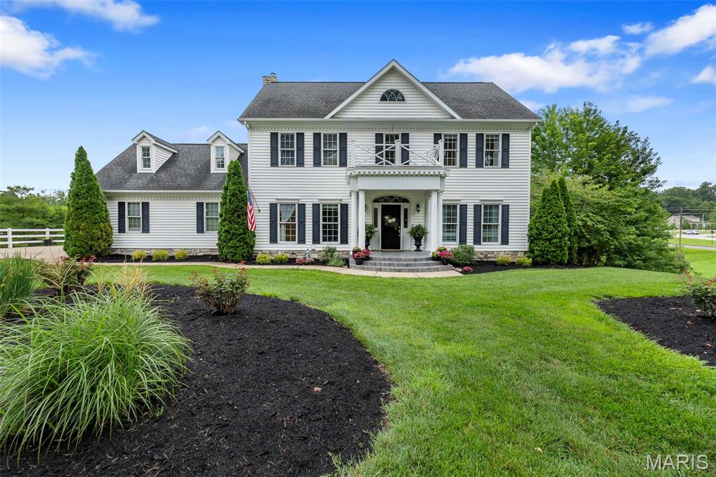 Cue the fireworks! This is the home YOU’VE been waiting for (and the one everyone else in town will say “I’ve ALWAYS loved that house!”)

Celebrate this summer with room to spread out, entertain, and make lifelong memories, in this stunning 5 bed, 3.5 bath  home set on an incredible, expansive lot! From the classic white exterior to the picturesque tree-lined white fence, this property captures timeless beauty at its finest.

Inside, you’ll find beautiful craftsmanship throughout, including a show stopping kitchen with gorgeous custom cabinetry, a large center island, abundant storage, and seamless flow into the inviting family room featuring custom built-ins and a cozy fireplace. Escape to the elegant den with its striking stone fireplace, host holiday dinners in the formal dining room, or enjoy casual mornings in the sunny eat in kitchen.

The spacious primary suite is your own private retreat with a luxurious soaking tub, while the mostly finished walkout basement offers endless possibilities with a kitchenette/bar, recreation space, and room for guests.

Outside, the expansive backyard is ready for everything from backyard games and summer barbecues, to evenings on the deck under the stars. Fresh landscaping and updated lighting add the perfect finishing touches to this move in ready home. 

So fire up the grill, gather your friends and make this spectacular home the backdrop for your next chapter. Schedule your private showing before this beauty is gone!