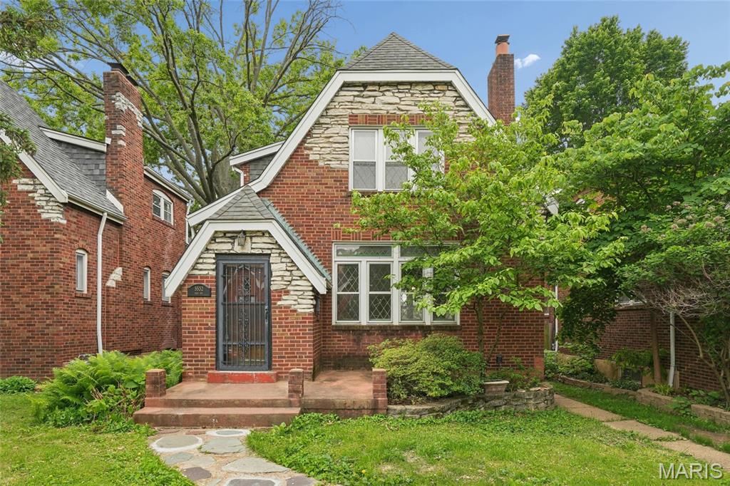 Open House Sun 1-3 June 7. 
Don't miss this Architectural Gem on Rosa in South Hampton. A Charming entry foyer and Stunning Rooms with Beautiful wood paneling, Stain glass windows and period light fixtures. The Living room offers a unique Stone Fireplace flanked by beautiful Stain glass front Cabinets and opens to the spacious Dinning room.  A nice Kitchen with an enclosed back porch that opens to A generous back yard. She features a T-staircase to Upstairs, from Kitchen or living room.  Three Bedrooms and an updated Bath; beautiful Hardwood floors, stain glass windows, and loads of wonderful natural light! Partially finished basement with Knotty pine finishes and 1/2 bath; Walks-out to that lush back yard-Great Space! A Detached garage with alley car entry completes the package. You will appreciate this Walkable South Hampton community-City Living at its finest!