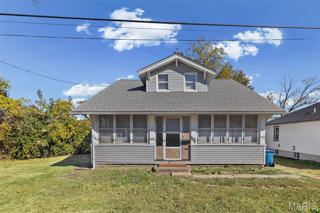 Step into this inviting 3-bedroom, 1-bath bungalow featuring timeless hardwood floors and built-in bookshelves that add character and warmth. The screened-in front porch offers a peaceful spot to enjoy morning coffee or unwind in the evening. The main floor layout is both functional and cozy, while the walkout basement—currently unfinished—provides ample potential for future expansion, storage, or workshop space. A perfect blend of charm and opportunity awaits.
Newer Vinyl Windows, Water Heater, Roof, & HVAC 2024.