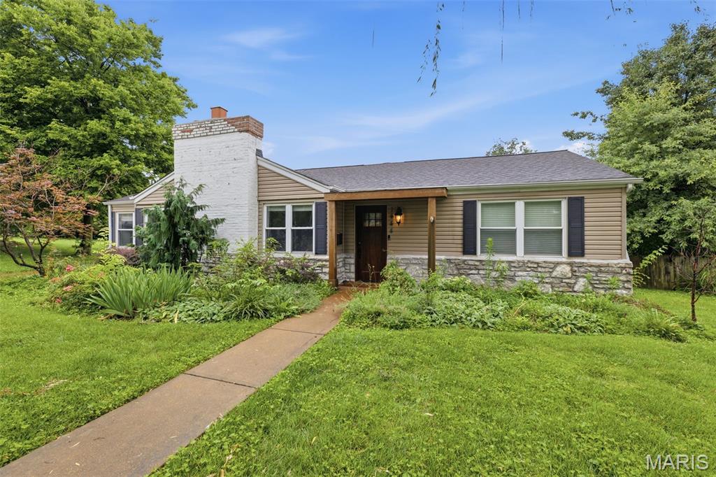 Welcome to a home where timeless character meets thoughtful updates in the heart of Webster Groves. From the moment you step inside, you’ll appreciate the warmth and charm throughout, beginning with a formal sitting room that’s perfect for welcoming guests or enjoying a quiet evening at home. This connects to the formal dining room currently being used as an office. The beautifully updated kitchen offers plenty of counter space, stylish finishes, and flows effortlessly into the spacious great room featuring exposed wood beams, vaulted ceilings, a stunning stone fireplace, and elegant chandeliers that make the space feel both cozy and elevated. Tucked away, the primary suite feels like its own private retreat with a walk-in closet and a beautifully updated bathroom complete with exposed brick and a classic clawfoot tub with separate shower and toilet. Everyday living is made easy with main-floor laundry and a functional mudroom with custom cubbies to help keep everything organized. With three fireplaces throughout the home, you’ll always have the perfect spot to cozy up no matter the season. Step outside to enjoy the large deck with a pergola overlooking the fenced backyard—ideal for summer barbecues, morning coffee, or simply relaxing while the kids or pets play. Located just minutes from Webster Groves’ new recreation complex, swimming pool, ice arena, tennis courts, parks, shopping, and dining, this home offers the perfect blend of charm, convenience, and modern comfort. Come experience everything this special home—and Webster Groves—has to offer.