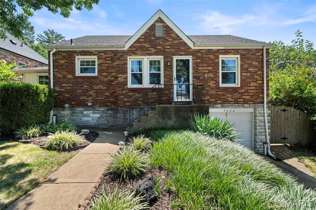 Located in the heart of Shrewsbury, this charming 2-bedroom bungalow offers thoughtful updates, a surprisingly flexible floor plan, and an unbeatable central location just minutes from Webster Groves, shopping, restaurants, and easy highway access. Inside, newer luxury vinyl plank flooring (2024) flows throughout the living and dining areas, bedrooms, hallway, and bathroom, creating a fresh and cohesive feel. The dining area opens directly to the updated kitchen featuring stainless steel appliances and abundant cabinetry. Just beyond the kitchen, a bonus room provides valuable extra space for a home office, workout area, mudroom, or additional storage. Two comfortable bedrooms and a full bath complete the main level, while the lower level provides plenty of storage along with convenient access to the attached one-car garage. Outside, the large, flat, privacy-fenced backyard offers plenty of room for entertaining, gardening, pets, or simply relaxing outdoors. Recent improvements include updated window treatments (2024), central air replaced in 2021 with an Air Scrubber, newer vinyl windows, and PVC sewer lateral replacement beneath the home in 2020. Combining move-in-ready updates, a spacious backyard, attached garage, and a convenient Shrewsbury location with quick access to Highway 44 and everything Webster Groves has to offer, this home delivers easy South County living in a location that’s hard to beat.