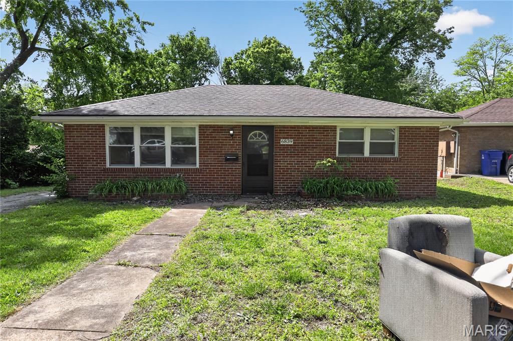 Charming brick single-family residence located in the heart of University City at 6839 Chamberlain Ct has 2 bedrooms, and one bathroom. This well-maintained home offers timeless character paired with everyday functionality on a quiet residential street. The exterior features classic mid-century brick construction, low-maintenance design, and a private yard space ideal for outdoor enjoyment or future customization.

Inside, the home presents a practical layout with comfortable living areas, ample natural light, and original architectural charm consistent with its 1950s build era. The kitchen and bath spaces provide a great opportunity for personalization or modern updates, while the overall structure remains solid and well-suited for long-term occupancy.

Situated on a peaceful street with public utilities, paved road frontage, and convenient access to major thoroughfares, shopping, dining, and nearby parks, this property blends residential tranquility with urban accessibility.