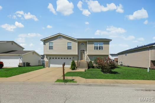 Welcome Home to this 4 bd 2 bath home with 2 car garage, brand new roof and siding. Make your way up the cute little front porch into the split foyer and head upstairs to find the living room, spacious kitchen with island and French Doors leading out to the large deck overlooking the large flat fenced in backyard. Head down the hall to find the main bathroom with ceramic tile flooring, primary bedroom and bathroom and 2 additional bedrooms. Head back down the stairs to the lower level where you will find the large 4th bedroom with large walk-in closet. Rounding out the lower level is a laundry area and access to the large 2 car garage with built in storage. Showings to start at open house 7/19 from 1-3pm