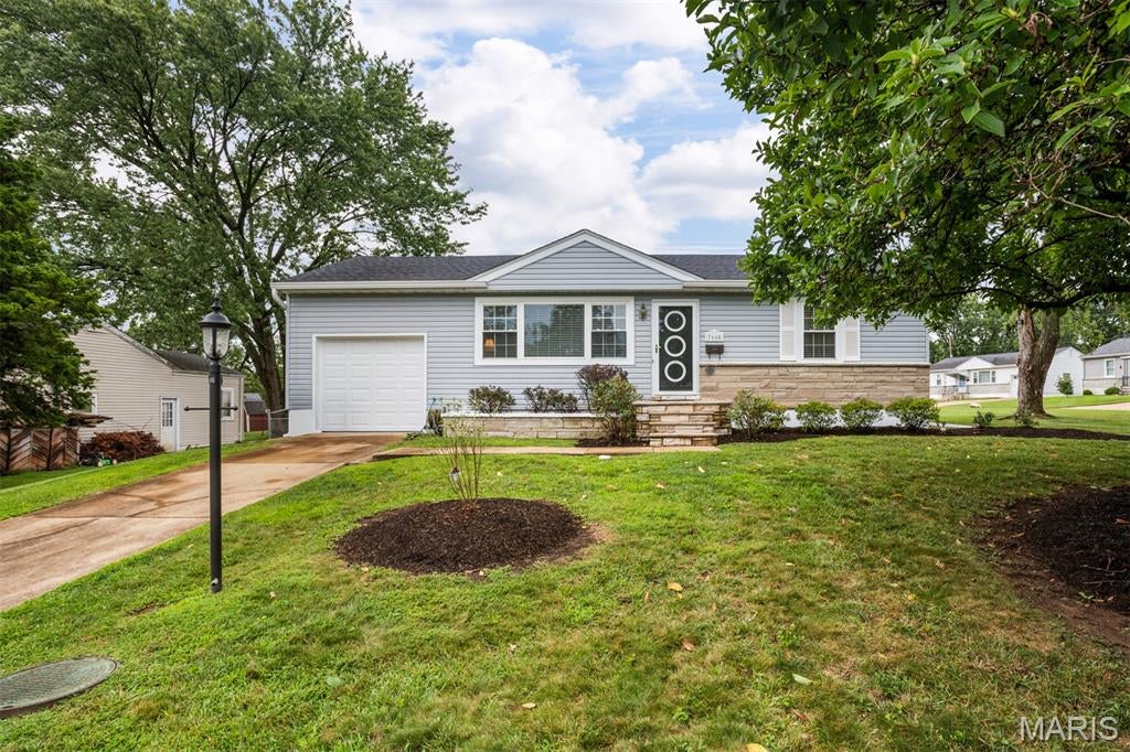 You better hurry, this one is a winner and priced to sell quick! Fabulous location, minutes from shopping, restaurants, highways and public transportation. This home shows like a dream, fresh paint, newer flooring in main floor family room, kitchen and lower level.  New roof, HVAC and garage door (2026.)  Nice size living room, big eat in kitchen with new stainless steel appliances (2026.)   Two nice size bedrooms. and a light and bright bath round out the main level.   Need room to grow, head downstairs where you will find huge rec room complete with a kitchen sink! Another full bath and laundry. There is an attached garage and fully fenced level yard . Move in, unpack and enjoy!