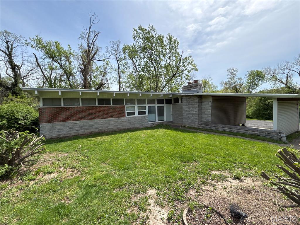 Check out this perfect investment opportunity!!! This three-bedroom; one-bathroom located in North St. Louis County, MO has an all brick exterior in the front, carport, and a rear deck. The interior has been freshly painted all neutral colors, with brand new luxury vinyl plank flooring, full kitchen with kitchen appliances, and main level laundry. Finished walk out basement with plenty of room for storage. Property is currently occupied bringing in $1,406/month, HUD pays the majority of that portion.