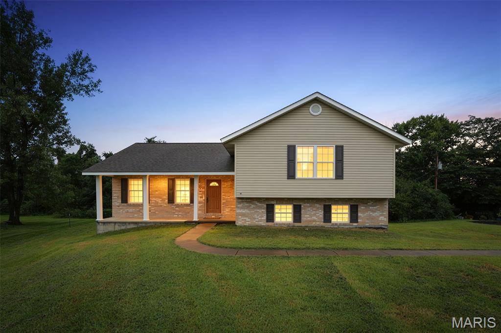 Immaculately maintained, one-owner home in a quiet cul-de-sac setting! Tucked away at the end of Trevor Court, this 3-bedroom, 2-bath split-level home offers 1,488 square feet of finished living space on just over half an acre. Although the mailing address is Bonne Terre, the property is conveniently located just behind Walmart in the Desloge area, offering quick access to shopping and amenities while maintaining a peaceful neighborhood setting.

Step inside and you'll immediately see the pride of ownership. Beautiful hardwood flooring highlights the main living areas, and the home's traditional plaster walls have remarkably never had a single nail hole—nothing has ever been hung on them since the home was built. The kitchen is equipped with appliances that stay with the home, making the transition even easier for the next owner.

Out back, enjoy the deck overlooking mature trees and a wooded backdrop. The positioning of the home and surrounding trees provide a surprising amount of privacy from neighboring properties—a great place to relax and enjoy the outdoors.

The unfinished walkout basement offers tremendous potential for additional living space and already has wall framing in place, giving the next owner an excellent head start toward finishing it to suit their needs. You'll also find an impressive plumbing manifold system providing organized, individual water-line control throughout the home.

Built in 2008 and lovingly maintained by its original owner, this is the kind of property where the care is evident throughout. Move-in ready today with room to grow tomorrow—411 Trevor Court is ready for its next chapter.