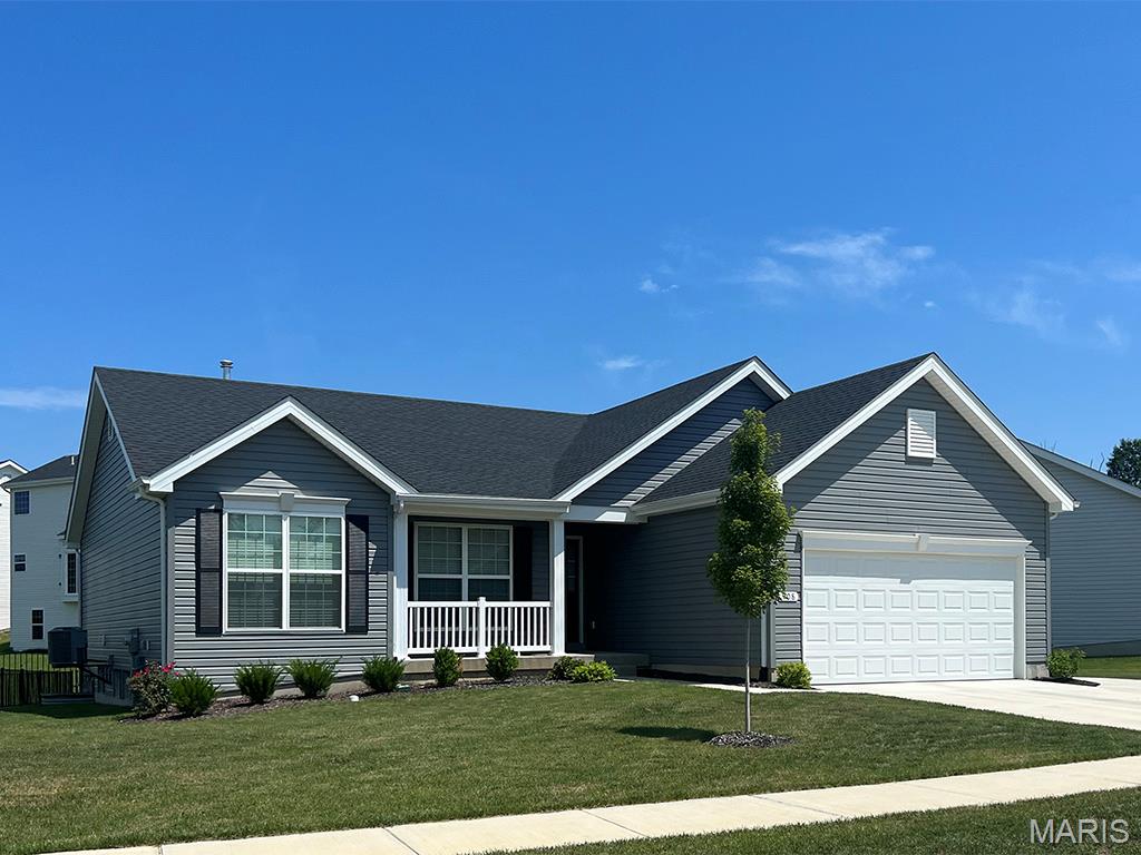 Hickory 4BR, 2BA ranch move-in ready this summer by McBride Homes! Walkout homesite! This open floorplan features beautiful wood laminate flooring, vaulted ceilings & 6ft windows. The kitchen boasts 42” Landen Burlap cabinets, quartz countertops, stainless steel GE appliances, & a walk-in pantry. Spacious dining area w/sliding doors to the backyard. Great room offers a ceiling fan & 2 windows for natural light. Primary suite includes a large walk-in closet & private bath with double vanity, large tub with a window, a walk-in shower, & linen closet. 3 add’l bedrooms w/ ceiling fan prewires, plus hall bath and linen closet. Extras include: 2 panel interior doors, main floor laundry, and ¾ bath rough-in at lower level for future finish! Windswept Farms offers Jeff Co taxes, and great onsite amenities! Enjoy peace of mind with McBride Homes' 10 year builders warranty and incredible customer service! Similar photos shown.