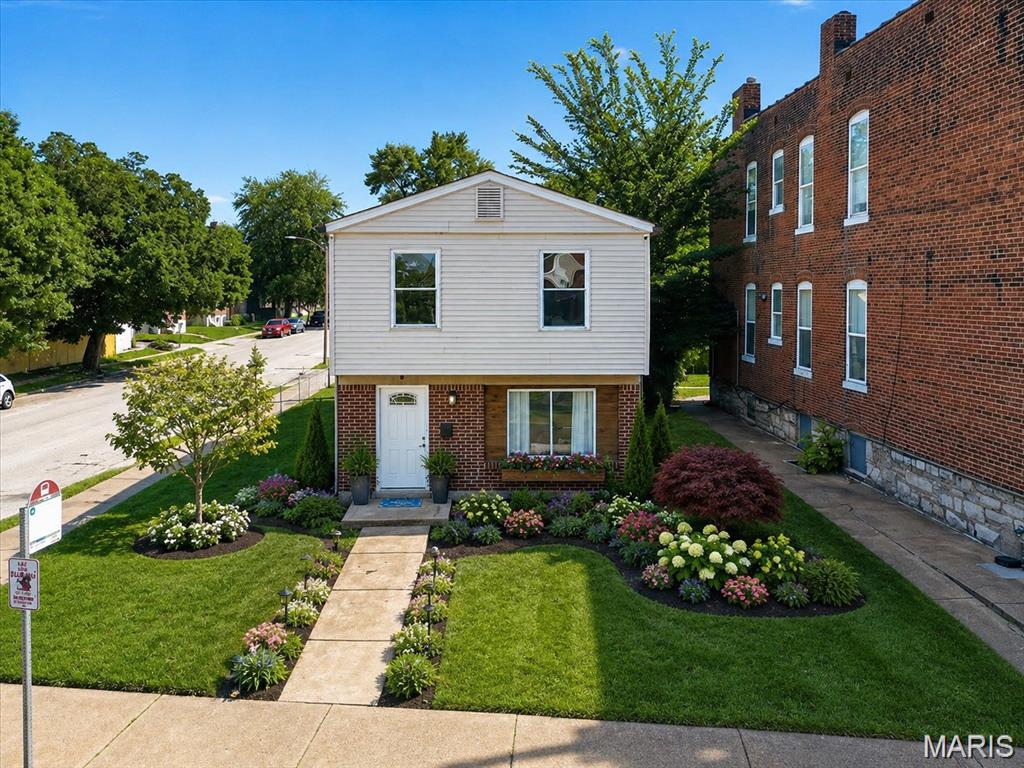 Completely updated and move-in ready in sought-after Benton Park West! Modern finishes, spacious rooms, and major system updates make this home a must-see. This charming 2-story home offers 4 bedrooms, 1.5 baths, and numerous recent updates throughout. Enjoy a brand-new chef's kitchen featuring granite countertops, white cabinetry, stainless steel appliances, a stove, a sink, and stylish finishes. Additional improvements include a new air conditioner, updated electrical panel, fresh interior paint, new flooring on the first floor, six-panel doors, updated lighting fixtures, newer vinyl windows, and exterior doors. The second floor features three spacious bedrooms with refinished hardwood flooring. Both bathrooms have been tastefully updated with new vanities, mirrors, toilets, shower surround tiles, and a refreshed bathtub surround tiles, new bedroom windows (2 of 4 rooms), new AC and new exterior door. Outside, you'll find large level front and back yards, perfect for entertaining, gardening, or simply enjoying the outdoors. Conveniently located near parks, restaurants, shopping, and downtown St. Louis, with easy access to Highways 44 and 55 for a quick commute. This turnkey home combines modern updates, classic charm, and an unbeatable city location. Schedule your showing today!