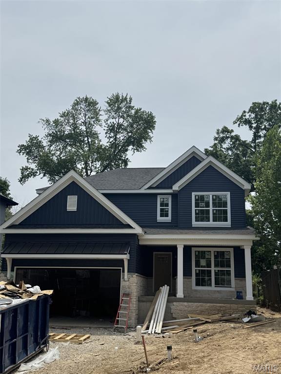 New Construction, 2-story, 5 bedroom, 3.5 bath by Schindler Homes LLC in Kirkwood. This beautiful home features 9' first floor ceilings, hardwood flooring entire 1st floor, wainscot trim in den, stainless steel Kitchen-Aid appliances with chimney hood, 42 inch shaker kitchen wall cabinets with soft close drawers and doors, pull out trash cabinet, under cabinet lighting with light rail, walk-in pantry, quartz countertops, mudroom on 1st floor with custom lockers, fireplace in family room, luxurious master bath with double sinks, Moen plumbing fixtures, separate tub and shower, his and hers large walk-in closets, large 2nd floor laundry with cabinets/granite folding counter, 50 gallon hot water heater, cased out windows, tall pour and finished lower level, and architectural grade shingles. Will have fully sodded yard and professionally landscaped. Great location, convenient to highways, parks, and shopping. Projected July finish date.