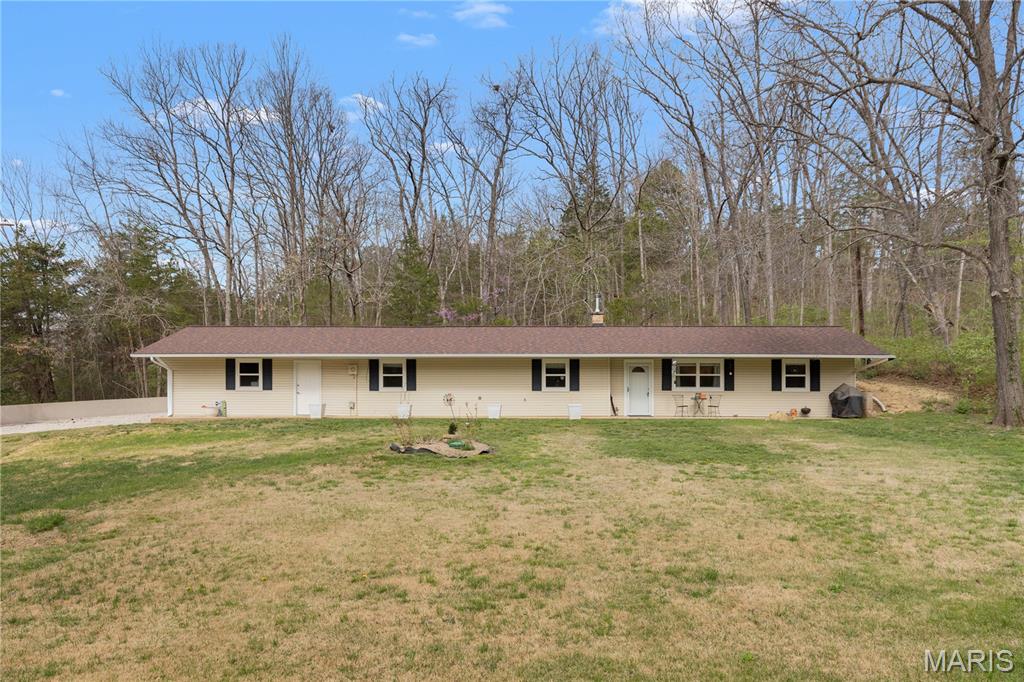 KICKOUT. CONTINUE TO SHOW. Updated ranch home on a secluded half acre. New gourmet kitchen (2023) with granite countertops and stainless steel appliances (refrigerator included). Open great room with electric heat stove and floor-to-ceiling brick mantel. Attached oversized two-car garage with shelving (included) & new garage door opener (2025 - $1k). New water heater and water softener (2025 - 6k). New luxury vinyl plank floors throughout (2023). New windows (2023). New front door (2023). New electrical system (2023). New architectural-shingle roof (2022). New gutters with screens (2025 - $2k). New exterior faucet (2025). Fresh paint throughout (2023). Certified for wood-burning stove.