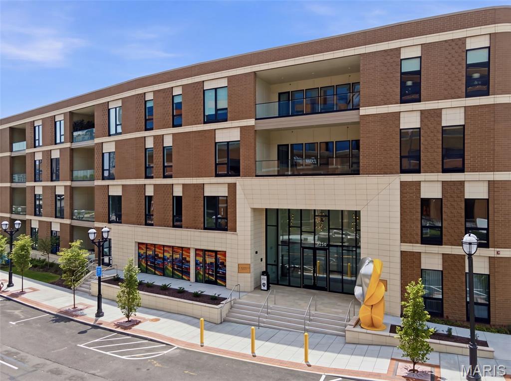 Completed custom 3 bed, 3.5 bath 3243 sq ft unit overlooking Forsyth and Maryland.  The current owner selected high end finishes throughout this light filled unit.  Find SubZero/Wolf/Cove appliances, designer countertops and curated lighting throughout.  The primary suite with luxury bath and walk in custom closet is tucked away in one corner offering quiet privacy while 2 additional large bedrm suites, office/exercise rm, guest powder rm and large laundry rm comprise the opposite side of the unit.  The large, covered balconies offer an extended living area and the other is situated off the custom kitchen providing another option for outdoor dining.  This is one of the larger units and is located on the 3rd floor.  Seller had a change in plans and is sad to let it go.  A perfect opportunity to move right into Clayton’s newest premiere luxury offering.