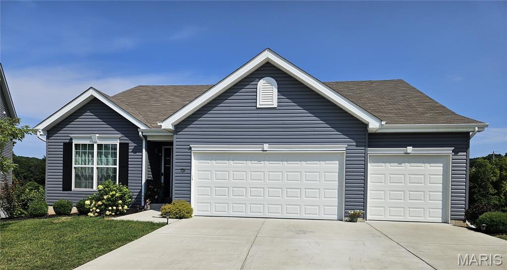 Why wait for your dream home to be build when this like new, almost 2000 sq ft., meticulously maintained MAPLE EXPANDED could be yours today. It's listed under market value and ready for a new family to call it home! It has 3-bedrooms and 2 baths and comes with golf course like views with lots of privacy. THIS IS A MUST SEE! It boasts 42" custom cabinetry, quartz counter tops, a large kitchen island with plenty of seating, custom lighting, wood spindled staircase and stunning wood laminate flooring which extends throughout the main floor. The natural light floods in through the 6' windows into the vaulted oversized great room and kitchen. The sunrise views from the back of the house are breathtaking. The oversized primary bedroom is a dream, along with the spacious walk in closet and large luxury en-suite which includes soaking tub, double vanities with wave bowl sinks, enclosed water closet and walk-in shower with bench. Primary bedroom is braced and wired for a ceiling fan. The spacious walkout basement has a full rough-in for a future bathroom as well as plenty of storage and hang out/workout room. The walkout sliding doors lead to the large, private and level fenced in backyard with patio and gazebo for relaxing and entertaining. Home comes with a 10-year builder's warranty.