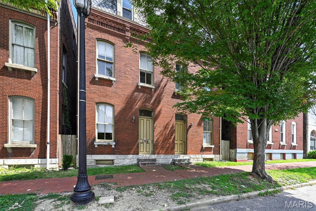 Welcome to 1704 S Tucker, a renovated 4-family offering immediate income, future upside & city living at the entrance to Soulard! Ideally positioned within walking distance of both Soulard & Lafayette Square and less than a mile from Lafayette Park, this property offers the best of two of St. Louis’ most desirable historic neighborhoods. Three of the four units were fully renovated in 2026. The building features two 1-bedroom, 1-bath apartments, both leased at $1,150/month EACH, plus two spacious 2-bedroom, 1.5-bath townhome-style units with private balconies. One townhome has been fully renovated and is ready for an owner-occupant or tenant, currently advertised at $1,650/month with applications on file. The remaining townhome is occupied by a long-term tenant of more than 10 years, currently paying $1,000/month. Purchase fully occupied for immediate cash flow or move into the renovated townhome and let your tenants help pay the mortgage while you enjoy the best of city living. With updated units, multiple income streams, functional layouts & incredible walkability, 1704 S Tucker is a rare opportunity for both the savvy investor and owner-occupant looking to build wealth through real estate.