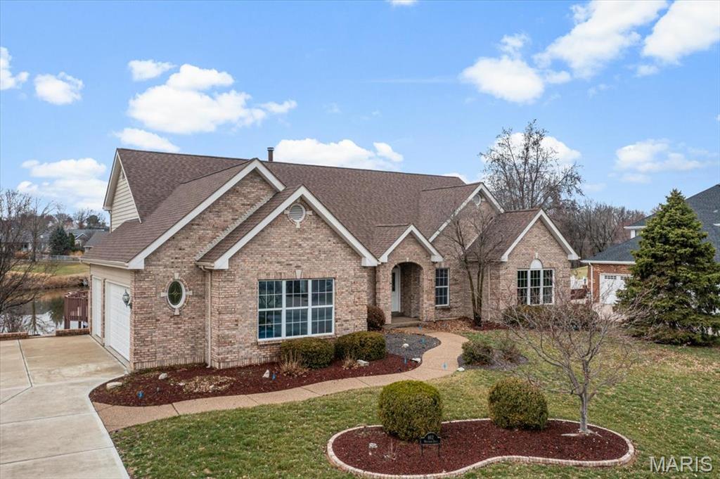 Welcome to this beautifully updated atrium ranch located in the sought-after Whitmoor golf community in Weldon Springs. Designed to capture natural light and scenic views, the home offers an open, spacious layout with over 4,300 square feet of finished living space and views of the lake and the second hole of the South course. A welcoming foyer leads into a vaulted great room with a fireplace and a dramatic wall of windows that fills the space with light and frames the picturesque setting beyond. The kitchen features custom cabinetry, granite countertops, and quality appliances, and opens to a bright breakfast area with access to the deck, creating the perfect space for everyday living or entertaining. The main level includes a spacious primary suite with coffered ceiling, large walk-in closet, and a luxurious bath with soaking tub and separate shower. An additional bedroom, full bath, and private study provide flexibility for guests or work-from-home needs. The finished walkout lower level offers exceptional additional living space with a large recreation room, wet bar, game area, two additional bedrooms, and a full bath. Step outside to enjoy multiple outdoor living areas including a deck with pergola and a patio surrounded by mature landscaping. Located within Whitmoor Country Club, Resident Memberships include access to community amenities including: Clubhouse dining, 4000 square ft. Fitness center, 2 pools, 2 tennis courts, 4 Pickleball courts and Two 18-hole championship golf course. This home combines beautiful views, generous living space, and the lifestyle that makes Whitmoor one of the area’s most desirable communities. Showings start Saturday, 03/28/26