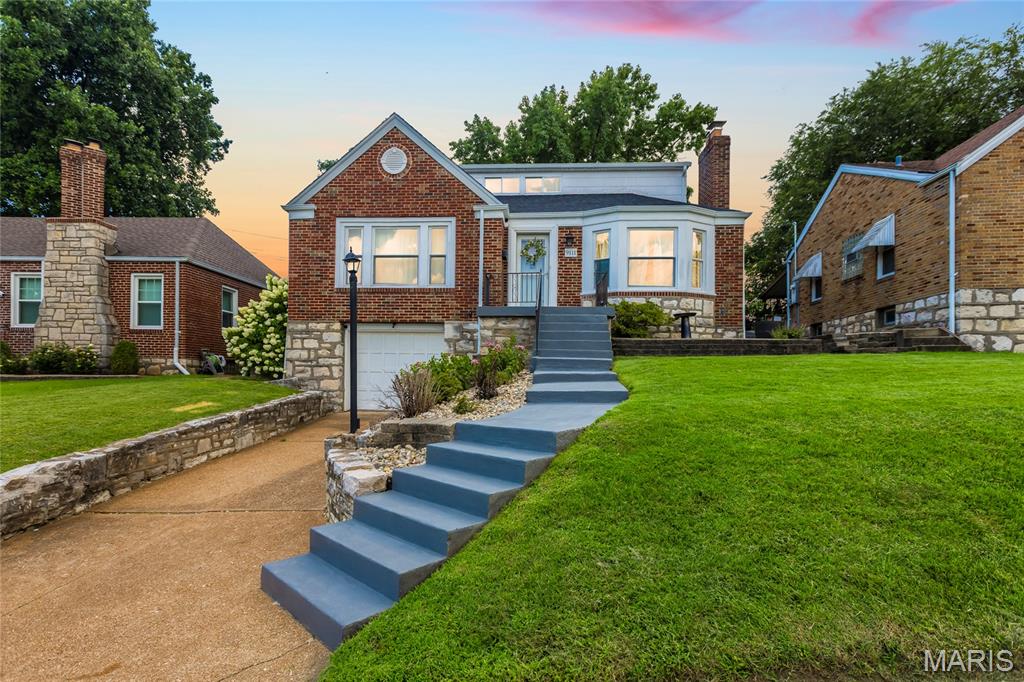 Welcome to this beautifully updated Affton charmer, where timeless character meets modern updates and a versatile floor plan you'll love!

The front living area showcases a charming decorative fireplace and hardwood floors that flows seamlessly into the dining area. The beautifully updated kitchen with ample cabinet space and quartz countertops, making everyday living and entertaining a breeze.

Just beyond the kitchen, you'll find a spacious second living area with a second decorative fireplace, perfect as a family room, playroom, home office, or media space. Step outside onto the freshly painted deck overlooking the level backyard, offering plenty of room to relax, entertain, or play!

Upper level features two additional bedrooms, including a spacious primary retreat with a newly updated en-suite full bathroom. A spacious tuck-under garage provides convenient parking and additional storage.

Walking distance to 9 Mile Garden, just minutes from Grant's Farm, and Tower Tee!

Sale includes: shed, refrigerator, washer, dryer, microwave, closet furniture piece in the main level bedroom, excludes all cameras / security system. Swingset negotiable.