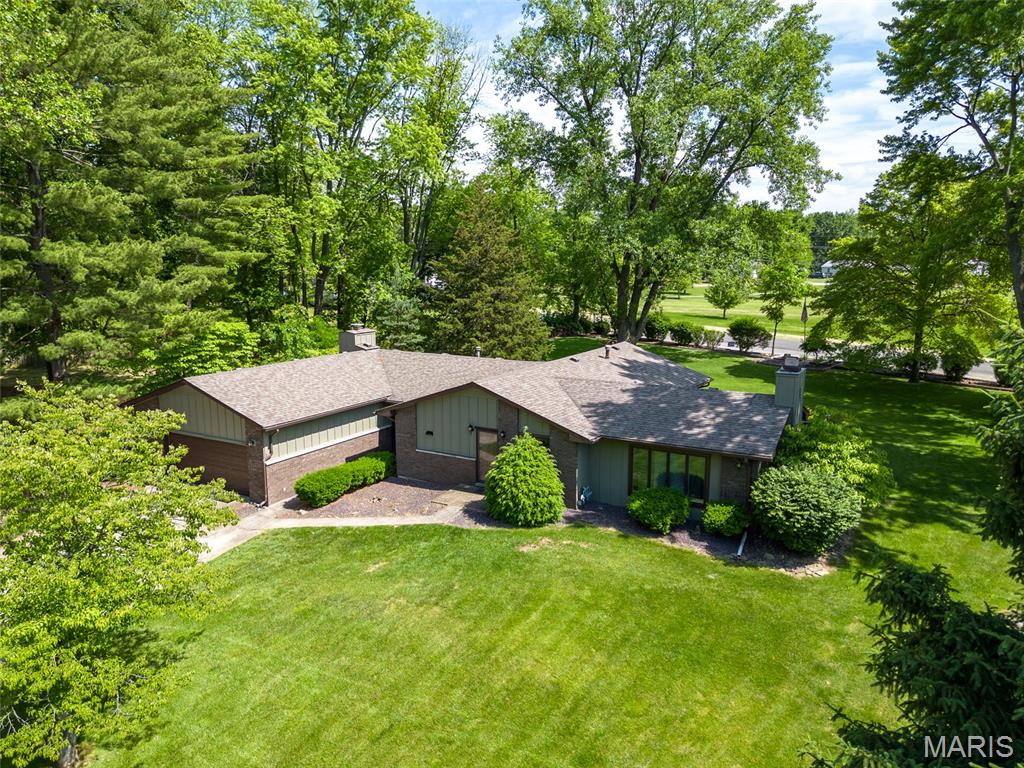 Experience the perfect blend of space, comfort, and convenience in this sprawling ranch-style home. Situated on an expansive 0.57-acre lot, this property offers a rare "park-like" atmosphere while keeping you minutes away from everything you need.
Home Highlights
**Spacious Living: Featuring 4 generous bedrooms and 2 full bathrooms, there is plenty of room for family, guests, or a home office.
**Warm Ambiance: The heart of the home is a beautiful living room anchored by a wood-burning fireplace, perfect for cozying up        during Illinois winters.
**Bonus Square Footage: The partially finished basement provides the flexible space you’ve been looking for—think media room, home gym, or a dedicated play area.
An Unbeatable Backyard
Step outside into your own private oasis. The massive backyard doesn't just offer privacy; it offers a lifestyle. There are several private area for quiet evening or your morning coffee.  Your property overlooks the stunning Schoen Park, giving you a front-row seat to nature.
Schoen Park offers Serene walking paths and a picturesque lake &  Coming Soon: pickleball, volleyball, and tennis courts are to be added.
Location, Location, Location
Located within the highly sought-after Edwardsville School District, this home balances quiet residential living with urban accessibility. You are just a short drive from local shopping, dining, and major interstates for an easy commute.