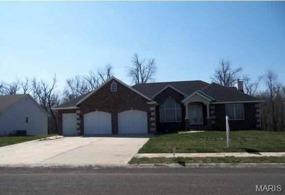 Atrium Ranch with Open Floor plan, Walk Out Basement, 3 car garage (3rd garage for golf cart). Custom Kitchen with stainless steel appliances including wall oven, gas range, French style refrigerator and granite counter tops. Walk in Pantry plus additional shelved storage area on main level. Great room boasts 2 patio doors plus stationary patio door for view of landscaped wooded back yard. 2 bedrooms, 2 baths plus family room (with plumbing for wet bar) and storage area in lower level. Best of all home has geothermal HVAC system with back up heat pump. Golf course within walking distance. An exceptional home in a lovely area.