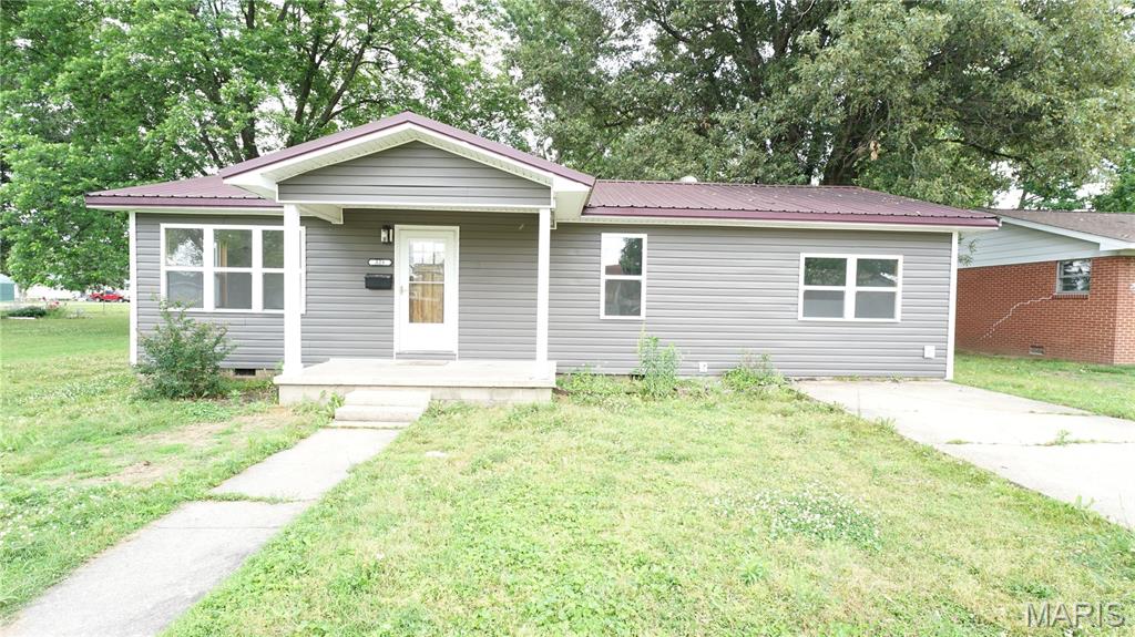 Located within the city limits of Dexter, Missouri and just minutes from Dexter West Park, this beautifully remodeled 3-bedroom, 1-bath home offers a perfect blend of classic character and modern updates. Step inside to find original hardwood flooring flowing through much of the home, paired with durable LVP in select areas for added style and function. The interior has been thoughtfully refreshed with new paint throughout, creating a clean and inviting feel. The kitchen features updated cabinetry, giving you a fresh, modern space ready for everyday cooking and entertaining. The bathroom has been completely renovated, offering a full modern update from top to bottom. Major system improvements include a newer metal roof, vinyl siding, updated HVAC, and a backup ventless gas heater providing peace of mind for years to come. Outside, enjoy a large backyard with convenient alley access—ideal for extra parking, future additions, gardening, or simply enjoying outdoor space. Move-in ready and located in a convenient in-town location close to parks and local amenities, this home is a great opportunity for first-time buyers, downsizers, or investors alike.