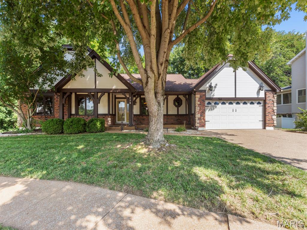 Tucked away on a private cul-de-sac in Riverwood Estates, this beautifully maintained ranch welcomes you with timeless curb appeal, featuring a charming front porch, classic brick facade, and elegant stone accents. Inside, the thoughtfully designed floor plan offers effortless flow between the living room, dining area, breakfast room, and kitchen—perfect for both everyday living and entertaining. The light-filled kitchen features an oversized galley layout with granite countertops, double ovens, abundant workspace, and easy access to the laundry room and oversized two-car garage. The spacious primary suite is a true retreat, complete with a beautifully updated ensuite bath, an impressive walk-in closet, and its own private deck overlooking the peaceful, wooded backyard. The walk-out lower level will be your family's dream space, offering lots of natural light and two large, amazing living areas that include, a double-sided breakfast bar, large built-in desk, a full bath, a 'bonus' room, and an oversized laundry room - the perfect space to work, play, entertain or welcome overnight guests! AND, there's more ... step outside to your own private oasis. Surrounded by mature trees, the backyard offers exceptional privacy with two spacious decks and a covered patio, creating the perfect setting for morning coffee, outdoor dining, or just taking a moment to relax. This is ranch living at its finest—offering comfort, functionality, and a beautiful setting in one of Riverwood Estates' most desirable locations.
