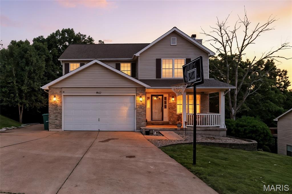 If you’ve been waiting for the perfect blend of space, updates, and privacy—this is the one that delivers.

With over 3,000 sq ft, this freshly updated 3 bed, 4 bath home offers the kind of room and flexibility today’s buyers are searching for. From the start, the oversized 2-car garage plus dedicated RV parking sets this home apart—because you shouldn’t have to compromise on space.

Inside, you’re welcomed by rich cherry wood floors, a cozy wood-burning fireplace, and fresh neutral paint that makes the entire main level feel bright, clean, and truly move-in ready. The kitchen has been refreshed with NEW tile flooring, stainless steel appliances (all included), a large walk-in pantry, and convenient main floor laundry—flowing effortlessly into the dining space and out to your 23x14 cedar deck. Morning coffee or evening wine hits different with a private wooded backdrop like this.

Upstairs, the primary suite feels like a true retreat—featuring a fully updated spa-style bathroom with a NEW tiled shower, Jacuzzi tub surround, NEW flooring, and a NEW double vanity. Two additional oversized bedrooms and a full bath give you the space you actually need—not just the bare minimum.

Downstairs, the finished walkout basement is where this home really shines—offering a large rec space, full bath, potential 4th bedroom, and a hidden book nook under the stairs that adds just the right amount of character. Walk right out to your second deck and backyard—perfect for entertaining or just enjoying the peace and quiet.

Sitting on OVER half an acre of wooded privacy, you’ll have room to spread out, explore, garden, entertain—or even have chickens if you’ve been dreaming of a little homestead lifestyle.

And the cherry on top? This home qualifies for USDA ZERO DOWN financing and also offers a VA assumable loan option—opening doors for more buyers than you might expect.

This isn’t just a house—it’s the lifestyle upgrade buyers are looking for. Full upgrades list available in supplements.