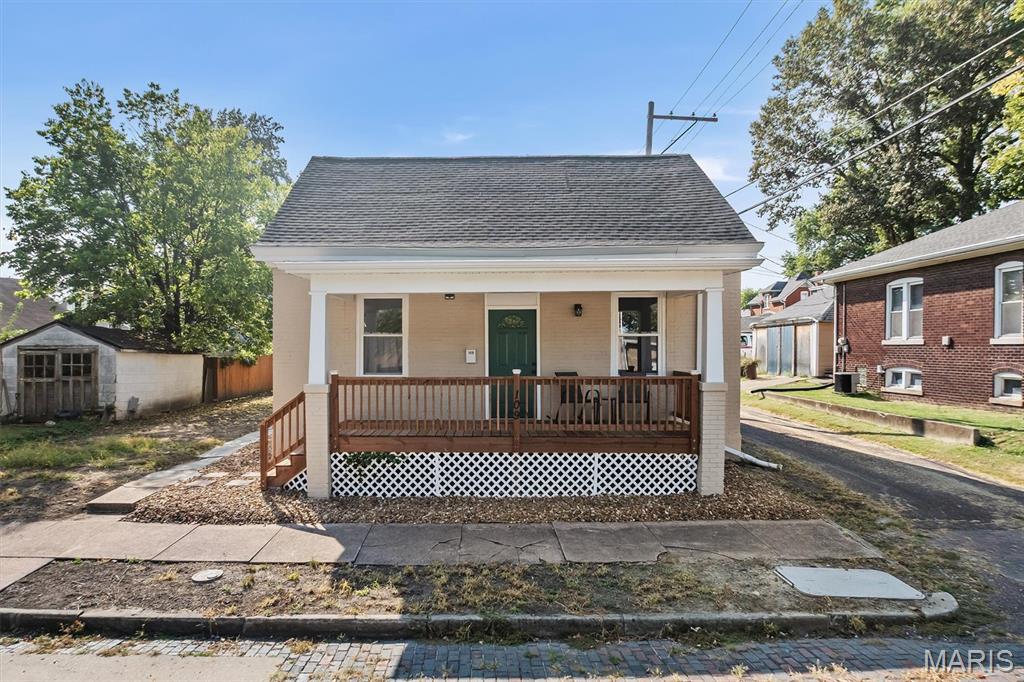 Completely rehabbed 2-bedroom, 1-bath all-brick home with classic charm and extensive updates. The home features new finishes, fixtures, appliances, and improvements throughout. The updated kitchen includes new appliances, and the dining room offers built-in storage. R-49 insulation has been added for improved energy efficiency.

Additional features include a front porch, detached 1-car garage, alley and city street access. An excellent opportunity to own a move-in-ready home with extensive improvements already completed. Walking distance to downtown shops, restaurants and events this is a perfect starter or downsizing property.