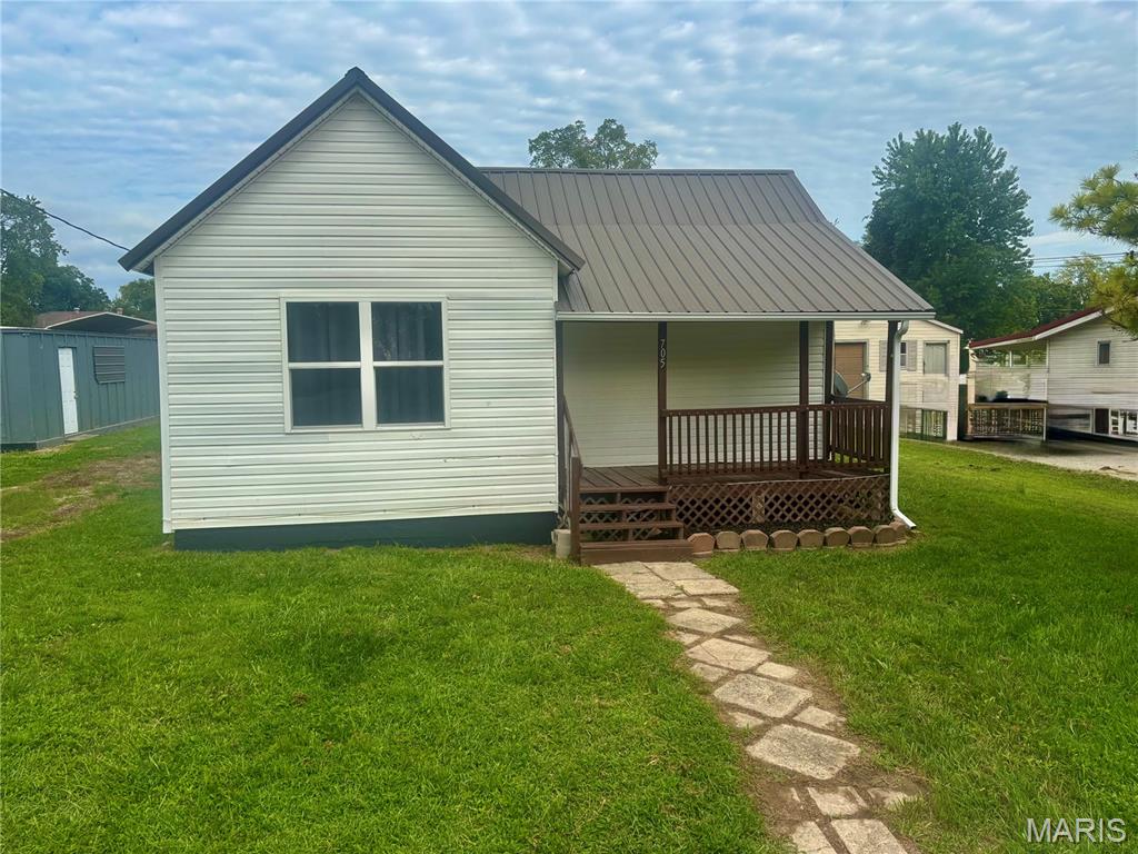 Super cute 2 bedroom 1 bath home, move in ready. Covered front porch, large flat yard, and off street parking. Home has a metal roof, it's been freshly painted and has new flooring. Storage container that gives you lots of storage for yard equipment and toys. Home has passed occupancy.