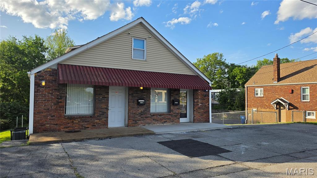 Great location, high traffic volume. Solid updated 3 level building with bathroom on each level. Can be easily separated in mutiple units. Main level offers 2 potential store fronts, second floor potential residential and lower level perfect for a shop or storage. Plenty of paved parking, with 4 spots in the front.