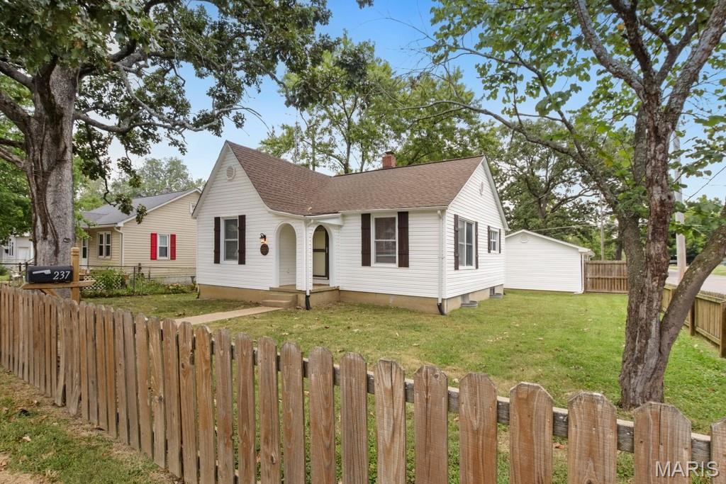 Unique opportunity with two separate homes on one parcel, offering flexibility for an investment property, owner-occupant with rental income, or extended family living. Both homes could be rented, or live in one and continue generating income from the other. The main home is a 2-bedroom, 2-bath residence featuring real hardwood floors, a gas fireplace in the living room, and a custom kitchen with stainless steel appliances, center island with butcher block countertops, and tile backsplash. An office/sitting area off the kitchen provides additional flexible space, while the basement offers ample storage, a hangout area, and additional usable space. The second home is a 2-bedroom, 1-bath residence with a spacious living area and is currently tenant occupied on a month-to-month rental agreement. Whether you're looking to add to your rental portfolio or offset your housing costs with income from a second residence, this property offers two complete homes and plenty of possibilities.