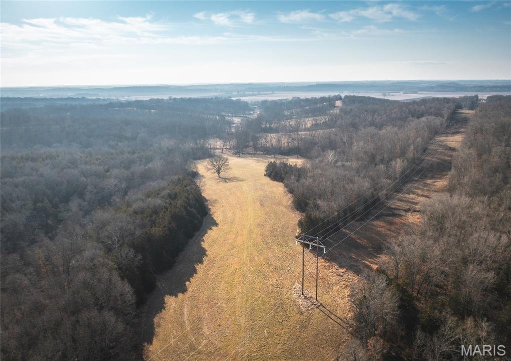 Discover the perfect blend of country living and outdoor recreation on this exceptional 32.5-acre tract located just outside Jefferson City. Offering a beautiful building site with scenic views and plenty of room to create your dream home, this property provides the rare opportunity to enjoy privacy and space without sacrificing convenience.
Whether you’re looking for a place to build, hunt, ride ATVs, or simply enjoy the outdoors, this versatile acreage has the room and potential to make it happen. The property’s mix of open ground and natural habitat creates excellent recreational opportunities while still providing an ideal setting for a homesite.
Location is everything, and this property delivers. Situated only five minutes from Jefferson City and just a short drive from Railwood Golf Club, you’ll enjoy easy access to shopping, dining, schools, and entertainment while still experiencing the peace and freedom of rural living. Railwood Golf Club is located just a few miles northeast of Jefferson City.  
If you’ve been searching for a manageable acreage with an unbeatable location, recreational appeal, and a fantastic building site, this 32.5-acre property deserves a closer look.
