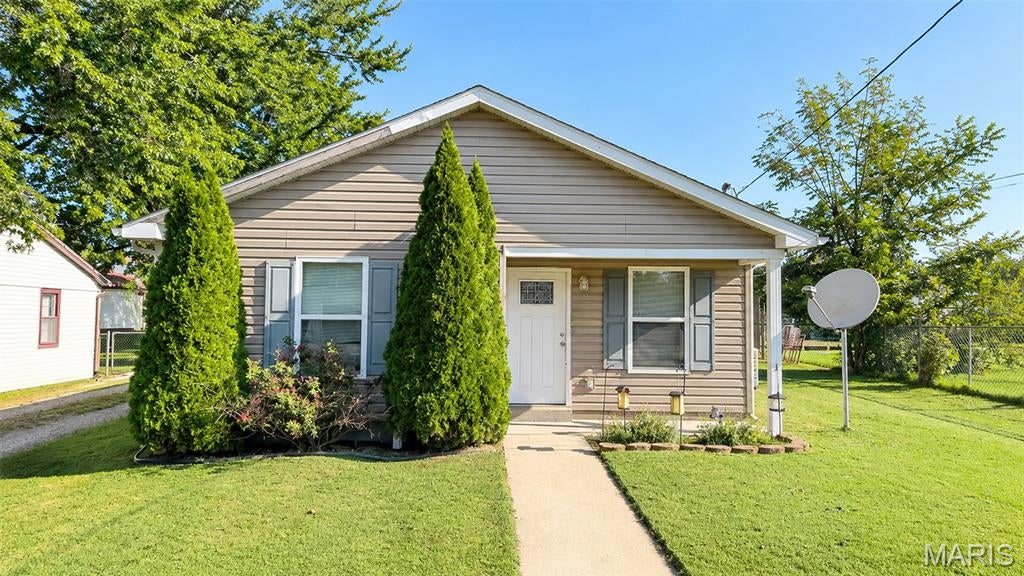 Enjoy easy living in this 2-bedroom, 1-bath home conveniently located in Fredericktown! The functional layout offers minimal upkeep with an open-concept living and kitchen area, two spacious bedrooms, and a full bath. Outside, you'll find a fenced-in backyard, storage shed, and level yard offering plenty of usable outdoor space. Whether you're looking for your first home, downsizing, or adding to your investment portfolio, this property is ready for its next owner!