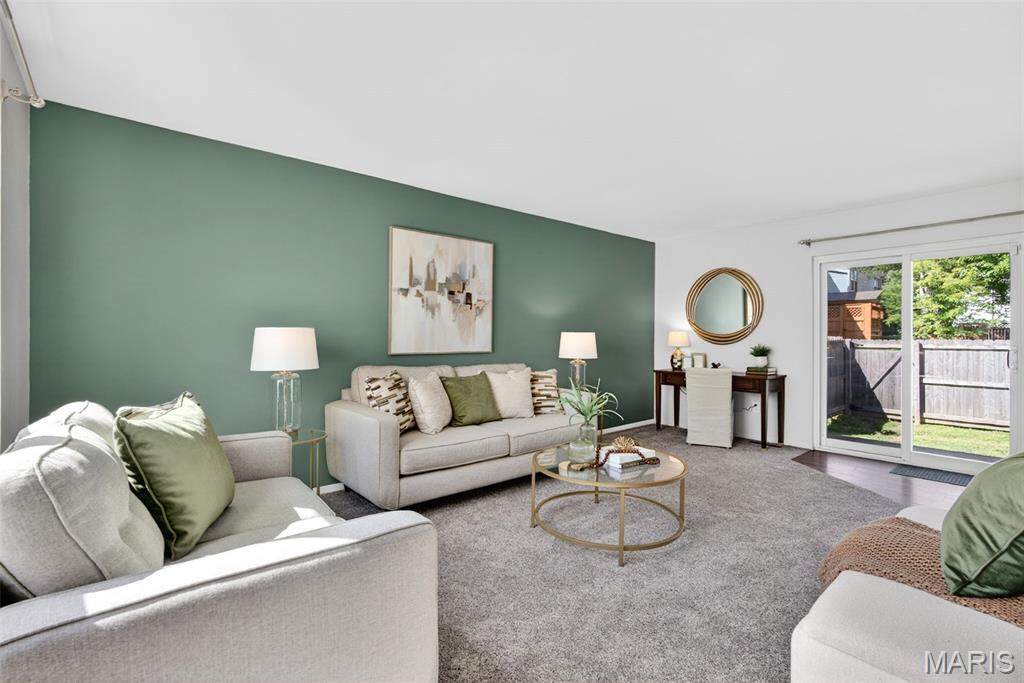 This is the one you've been waiting for! Welcome to Fox Village, where this spacious two-story townhome is tucked away on a quiet cul-de-sac with private wooded views.  This stunning place offers literally everything you might want in a home: a garage, a private back yard, laundry hookups, a finished basement plus room for storage, a separate dining room, a stunning updated kitchen, low HOA fees ($110/mo) AND a pool!! Plus all of the exterior maintenance (lawn care in front & backyard and snow removal), are included!! The primary bedroom is massive and has a private bathroom and large walk-in closet! 

Offering 3 bedrooms, 2.5 baths, this home features an open, light-filled floor plan designed for comfortable living and easy entertaining. The updated kitchen showcases crisp white cabinetry and LVP flooring, while the separate formal dining room provides the perfect setting for family meals and special gatherings. From the moment you step into the large foyer, you'll know this is the one for you!  Upstairs, the spacious primary suite offers a walk-in closet and private en-suite bath, creating a comfortable retreat at the end of the day. Two additional bedrooms and a full bath complete the upper level. The lower level expands your living space with a large recreation room, ideal for a family room, game room, or home office. A utility room provides ample storage and organization space, along with washer and dryer hookups. Step outside to the enlarged private patio, an ideal space to relax, entertain, or simply enjoy the peaceful backdrop. Both you & fido will love having your own private back yard!  You'll also have peace of mind knowing that the HVAC and water heater are newer and well maintained (2017 and 2018) and in addition, this unit has copper wiring and a newer 200 amp electrical panel. Conveniently located within walking distance of the community pool, this home offers the perfect combination of comfort, convenience, and a sought-after location in Ballwin! Located in the desirable Rockwood School District, & close to everything! Join us for the open house Saturday 6/6 from 10:00am-12:00pm!