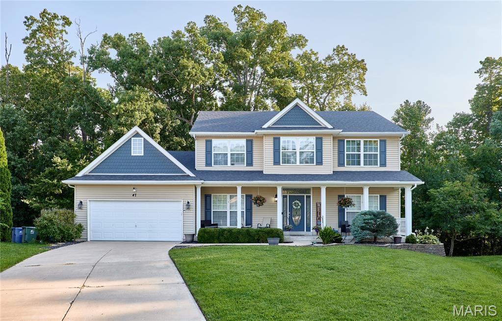 DO NOT miss this one! 5Bed/3.5Bath on a cul de sac backing to trees!! Great location (and safe exit) off the Peine roundabout exit! This home features hardwood flooring, formal dining room (coffered ceilings/wainscoting walls), formal office, living room with built in book cases & gas fireplace with a brick front, kitchen with granite countertops, stainless steel appliances, MAIN floor laundry, and the list goes on! FINISHED Lower level (walkout) with FULL KITCHEN (stove, microwave, sink, full sized fridge, & backsplash!), 2nd living room, 2nd washer/dryer hookups, and 2nd water heater! Lower level master features walk in closet and huge bathroom (2 sinks, soaking sub/separate shower). Upper level features 4Bedrooms/2Full Bathrooms, and a loft! Master has 2 sinks, walk in closet, vaulted ceilings, and tub/separate shower! Exterior features include deck, white vinyl fence, and mounted cameras! Don't miss out on this one- it's got it all!