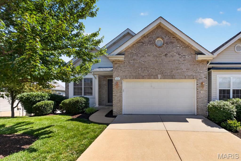 Beautifully maintained ranch villa offering a spacious, open layout with 3 bedrooms and 3 full baths. Wood flooring flows throughout the main level. The inviting vaulted family room features a gas fireplace and direct access to the composite deck, creating a comfortable space for everyday living and entertaining. A large dining room provides plenty of room for gatherings, while the kitchen is appointed with 42-inch cabinetry, granite countertops, an electric cooktop, and an adjoining breakfast room with custom built-in bench seating. The main-level primary suite offers a walk-in closet and an ensuite bath with double vanities, a walk-in shower, and a soaking tub. An additional bedroom, full bath, and laundry room complete the main level. The finished walk-out lower level with 9-foot ceilings adds valuable living space with a spacious family room, third bedroom, and full bath, ideal for guests or extended living arrangements. A large storage area provides abundant space for seasonal items, hobbies, or other items. Additional highlights include a 2-car garage, composite deck, and patio overlooking the backyard.