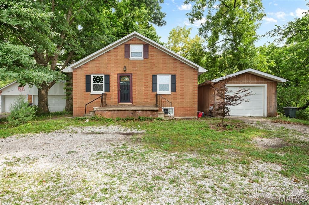 Charming 2-Bedroom Home on Approximately 1.2 Acres! Cute, charming, and full of character! This inviting 2-bedroom, 1-bath home offers a great opportunity for anyone looking for space, storage, and room to enjoy the outdoors. The large backyard is perfect for kids, fur babies, entertaining, or simply relaxing, and the additional lot(s) included bring the total property to approximately 1.2 acres.
Inside, you'll find plenty of charm and potential. The basement offers a dedicated workshop area along with tons of additional storage space. The unfinished attic provides an exciting opportunity to create additional living space, a hobby room, office, or whatever best suits your needs. The home is move-in ready and ready for its next owner to make it their own. The shared driveway adds convenience, while the generous acreage provides plenty of room to spread out. Affordable, adorable, and packed with potential—come take a look!
