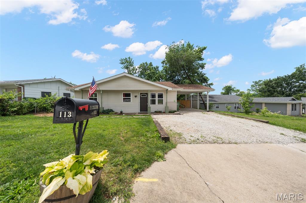 Welcome home to this charming 3-bedroom, 2-bath ranch-style home conveniently located in the heart of Rolla, just minutes from shopping, dining, schools, and everyday amenities. Step inside to a bright and inviting living room where luxury vinyl plank flooring flows throughout much of the home, creating a stylish and low-maintenance living space. The cozy eat-in kitchen offers plenty of room for family meals and features a conveniently tucked-away laundry closet. The primary suite includes a private bathroom with a shower, while two additional bedrooms and a full guest bath provide comfortable accommodations for family or guests. Outside, enjoy a fenced backyard complete with a patio area ideal for relaxing or entertaining, as well as a garden shed for extra storage. An attached carport adds convenience to this move-in ready home. Don't miss this fantastic opportunity to own a well-maintained home in a desirable Rolla location!