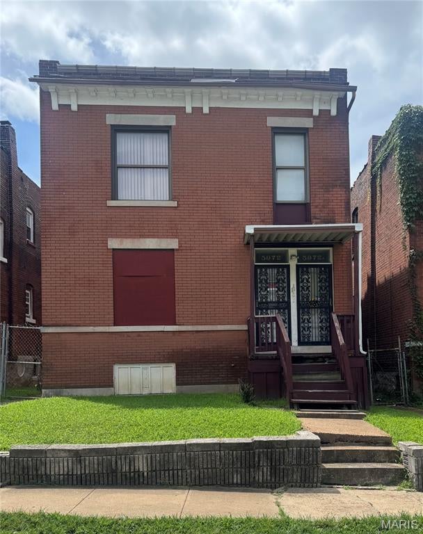 INVESTOR SPECIAL! Prime opportunity to purchase a two-family property in the Hamilton Heights area of St. Louis City. This property is being offered AS-IS and is ideal for an investor or rehabber looking to add value through renovation. Property features approximately 2,058 square feet with two units and offers plenty of potential for a full renovation or investment project. Seller will make no repairs or warranties. Buyer to perform their own due diligence and inspections. Cash offers only. Bring your vision and make this property your next investment!