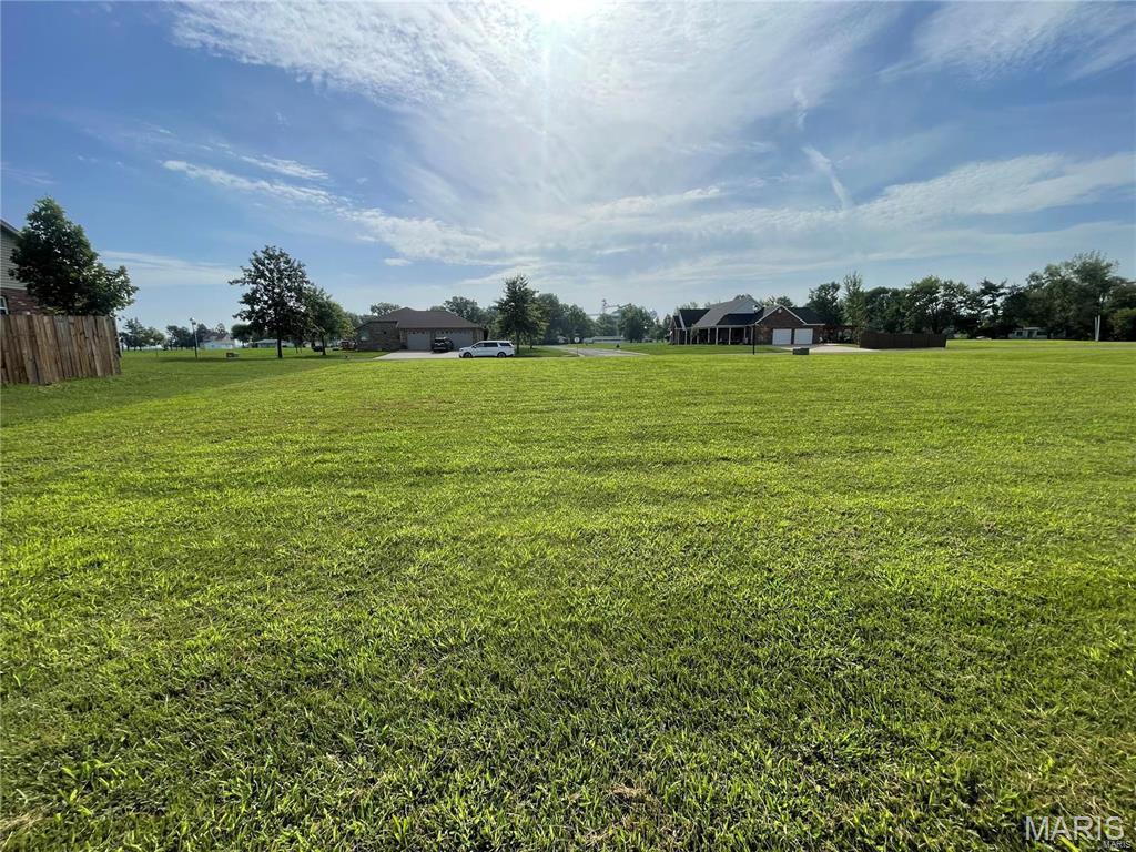 The perfect opportunity to build your dream home on this .35-acre lot in St. Libory. Nestled in a peaceful neighborhood, this spacious lot offers plenty of room to design the home you've always envisioned. Sewer and water tap fees have already been paid (approximately $5,000), adding extra value for the future homeowner. A basement is optional, not mandatory, giving you flexibility in your building plans, and the subdivision will take the dirt from excavation, making the building process even easier. With its convenient location, you'll enjoy easy access to local amenities while still experiencing the charm of small-town living. Don't miss your chance to create a custom home that reflects your unique style in this welcoming community. Contact us today for more information!