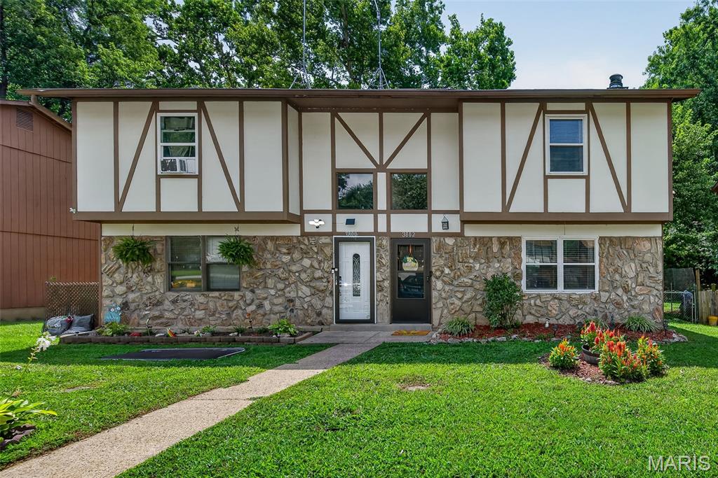 Don't miss out on this conveniently located townhouse in the Fox School District and Seckman Schools with many recent updates. The kitchen has white shaker cabinets (2025), a freestanding pantry, stainless steel appliances (2024), and a Pella energy efficient sliding door (2025) that opens to the large fenced back yard. Off of the kitchen is spacious laundry/utility room and between the kitchen and living room is a totally updated half bath. Flooring in the living room was replaced in 2025 with luxury vinyl plank flooring that adds a cozy feel for your evenings in front of the freestanding stove (never used by the current owner and included as-is). Upstairs are three bedrooms and an updated full bath. Both bathrooms have new vanities, light fixtures, mirrors and plumbing. New ceiling fans (2026) are in the entry foyer and kitchen.  For peace of mind the furnace and ac were serviced 6/26/2026. There are three parking spaces in front of this home that will be repaved this summer. Your association fee covers gutter cleaning twice a year, lawn mowing, trimming and blowing off sidewalks in addition to painting the exterior every seven years. Stop by and see your new home today! Ring doorbell does not stay.