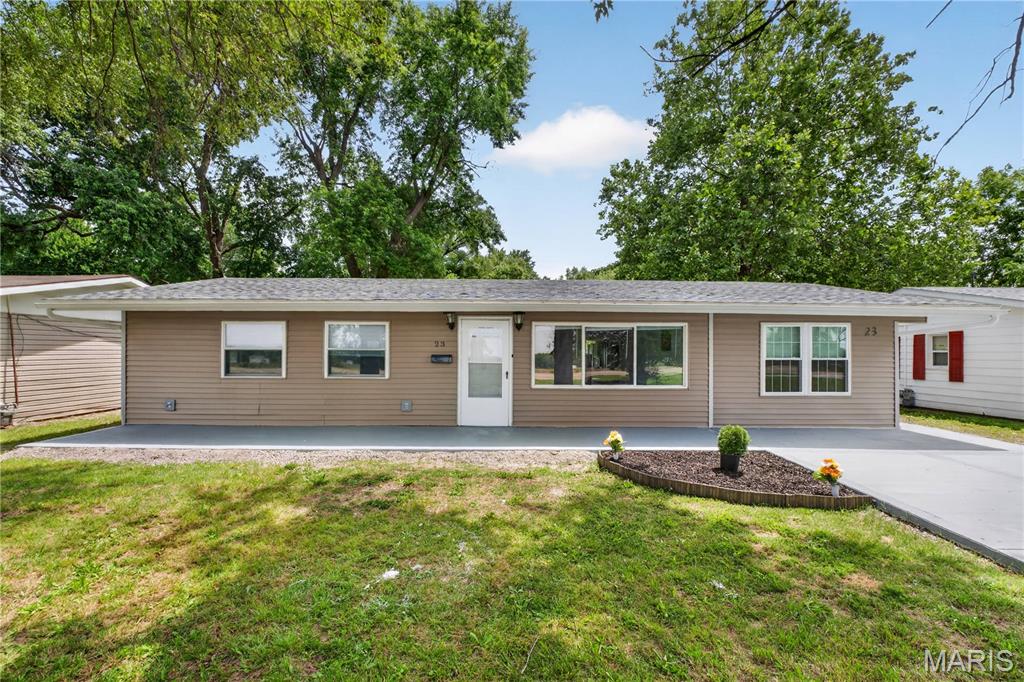 Fully updated, cute 4 bedroom, 2 bath home located on a dead end street with a large back yard and concrete patio ready for your finishing touches. Lot includes lots of mature trees for added shade and privacy. Kitchen boasts updated cabinets and stone countertops as well as stainless steel appliances including a gas range for a budding chef! Front exterior has two large shade trees, updated landscaping, and new concrete driveway. New roof with architectural shingles has a lifetime warranty! Ideal Location - Close to Shopping Areas, Public Transportation, and easy access to Interstate and Highways, within 20 minutes of downtown St Louis MO. Don't miss out on this turnkey Cahokia gem, schedule a walk-through today!