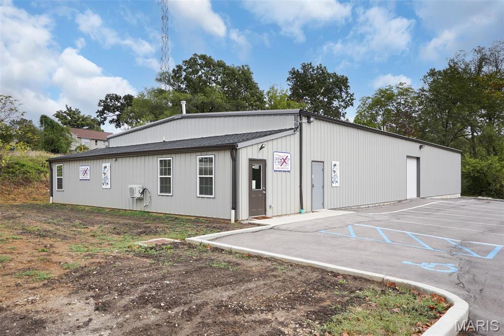 Skip the buildout. Skip the delays. Skip the months of planning, approvals, and rising construction costs… and step straight into a business that’s ready to go on day one.
This 2024-built indoor training facility in Warrenton isn’t just a building… it’s an opportunity sitting there waiting for the right person to walk in, turn the lights on, and get to work.
Picture this… it’s a cold winter night in Missouri. Fields are frozen. Practices are canceled everywhere else. But inside your facility, the lights are on, the doors are open, and the place is alive. Athletes are training. Teams are rotating through. Parents are lined up watching. And every hour that passes… revenue is being generated.
That’s what this space was built for.
With 5,600 square feet under roof, including approximately 5,000 square feet of open-span training space, this layout gives you the flexibility most buyers spend months trying to create. The 12–16 foot ceiling height allows for a wide range of uses, and the current setup, complete with turf, batting cages, and netting, means the heavy lifting has already been done. You’re not starting from scratch. You’re stepping into momentum.
But here’s where this property separates itself…
This isn’t limited to just one idea or one type of user.
Run it as a private baseball or softball training facility. Open a strength and conditioning gym. Launch a multi-sport performance center. Offer personal training, team practices, camps, leagues, or rent the space out by the hour. Build memberships. Host clinics. Create a place where athletes come year-round to improve.
Multiple revenue streams. One location. Already set up to support it.
And it’s not just for sports…
With flexibility in use, this property could also lend itself to a fitness facility, youth activity center, daycare concept, group or specialty training programs, or even a community-focused space depending on your vision. The structure, layout, and infrastructure give you options, which is exactly what smart buyers are looking for.
Inside, you’ll also find a finished office and reception area that creates a professional first impression from the moment someone walks in. There are two bathrooms, a shower for convenience, and functional space that supports both clients and daily operations. Two oversized garage doors allow for airflow, accessibility, and versatility depending on how you choose to run the business.
Outside, the property sits on nearly an acre, giving you breathing room and potential for future expansion, outdoor training areas, or additional improvements over time. With 23 parking spaces, you have the capacity to handle teams, classes, and consistent traffic without the headache of limited parking.
And let’s talk about what most people overlook…
Time.
If you’ve ever looked into building something like this, you already know what it takes. Land acquisition. Design. Engineering. Permits. Construction delays. Cost overruns. Months… sometimes years… before you ever open the doors.
Here… that timeline is gone.
You could close on this property and be operational almost immediately.
That’s a massive advantage.
Whether you’re a coach ready to build your own program, a trainer tired of paying rent to someone else, an entrepreneur looking for a business opportunity, or an investor searching for a property with multiple income possibilities… this is the kind of setup that rarely hits the market in this condition.
Clean. Functional. Nearly new. And ready.
Opportunities like this don’t come around often… where the building, the setup, and the potential are already in place. All that’s missing is the person with the vision to take it and run.
If you’ve been waiting for the right opportunity to step into something of your own… this might be it.