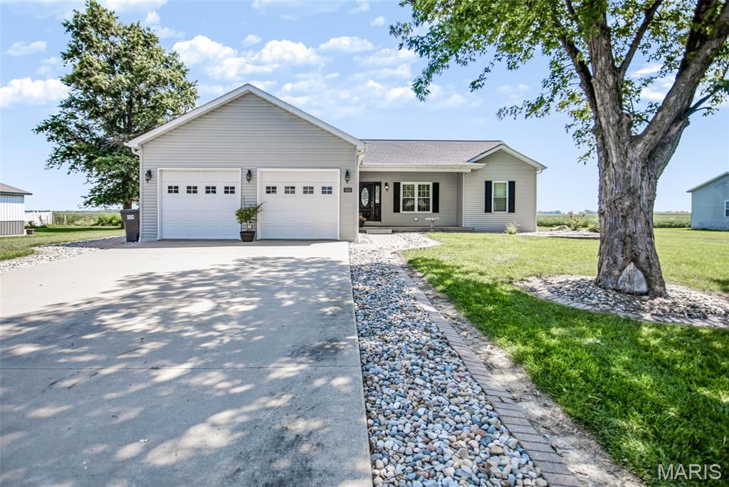 Expect to be impressed! This spacious 5-bedroom, 3-full-bath home sits on nearly an acre of land right in town and offers an incredible combination of space, updates, and outdoor amenities.
The entire home has been freshly painted, creating a bright and welcoming feel throughout. The windows were replaced in 2019, while the living room, kitchen, and patio door were recently replaced this year. Plus, there’s a brand-new roof on both house and detached garage. The oversized 2-car attached garage provides plenty of room for vehicles and storage, while the massive detached garage is over 48 x 26, complete with concrete floor, air compressor, plus has three doors and is approximately 4-car wide, perfect for additional vehicles, equipment, hobbies, or storage. The inground pool is truly an entertainer’s dream., with a new black aluminum fence around the entire pool and covered gazebo area, complete with a locking gate to help secure the space.
Inside, the open-concept living room and kitchen create the perfect gathering space, featuring an island ideal for entertaining. The split-bedroom floor plan offers added privacy, and the main-floor laundry adds everyday convenience.  The family room offers a 98 inch TV that stays, which is perfect for movie nights!  With so much to offer, including generous living space, extensive updates, a huge pole barn, and an amazing pool area, this property is one you won’t want to miss.