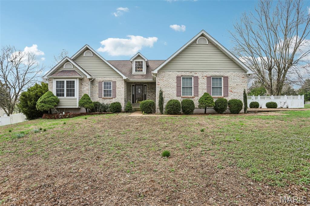 Welcome to a truly exceptional home in one of Desloge's most desirable neighborhoods of custom homes. On a large corner lot just shy of a one acre, this impressive property offers an abundance of living space designed for comfort, entertaining, and flexible living. Inside, you will find a spacious and well designed layout featuring a two car garage, three oversized bedrooms, four full bathrooms, two full kitchens, a Wet bar, multiple living spaces including a great room and two separate family rooms, plus a cozy fireplace that adds warmth and character to the home. The separate in-law living quarters provide an ideal setup for multi-generational living, extended family, or one great entertaining space! Outside you will enjoy the incredible outdoor living space. A massive composite deck that runs the full length of the home overlooks the backyard and pool area, creating the prefect place to relax. The pool is a 33x18 oval aboveground pool but has continued wood deck around to give an in-ground feel complete with a pool liner and pump that have both been replaced in the past two years, giving buyers peace of mind. But it does not stop there the backyard also has a fire pit hangout area, vinyl fence and a large storage shed with electric, providing great space for hobbies, tools, or extra storage. This home offers a rare combination of privacy, space, and convenience, all while being just a short walk to shopping, dining, and everyday amenities. Homes with this much space, flexibility, and outdoor enjoyment are hard to find. Book your showing today to see all this home has to offer.