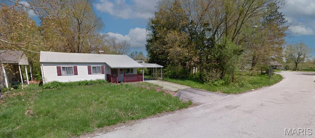 Sharp 3-bedroom, 2-bath ranch home featuring a 3-car-deep metal carport, providing ample covered parking and convenience. This property presents a strong opportunity for investors or buyers looking for their next project. The property is being offered as a cash sale only, with no contingencies accepted, and is sold strictly as-is, where-is. No interior showings will be permitted, no additional interior photos are available, and interior access for inspections will not be granted. No survey or keys will be provided. All listing information is deemed reliable but not guaranteed, and buyers are responsible for completing their own due diligence prior to submitting an offer. Buyers must independently verify all property details, including but not limited to the number of bedrooms and bathrooms, square footage, room sizes, lot dimensions, and any other relevant information. Photos and marketing remarks are provided for reference purposes only. By submitting an offer, the buyer acknowledges they have independently investigated the property and are making their purchase decision based solely on their own findings. Buyer or buyer's agent to verify all mls info
