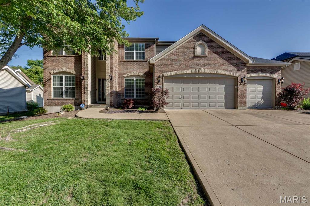 PRICE IMPROVEMENT on 10 Deergrass  - a stunning former Sequoia display model by McBride & Sons offering 3,100 square feet of thoughtfully designed space with LOADS of extras. This beautifully maintained and impeccably clean 4-bed, 2.5-bath home w/a 3-car garage combines timeless style, generous room sizes, and exceptional functionality for today’s living. From the moment you enter, you’ll appreciate the spacious layout, soaring ceilings, and elegant architectural details: custom wainscoting, crisp white picture-frame molding, oversized baseboards, and crown molding. The inviting main living area is anchored by a gas fireplace & custom built ins and wet bar. Rich, wide-plank dark hardwood flooring are in pristine condition. Expansive bay windows w/ plantation shutters flood the space w/ natural light while offering both privacy & classic style. Upstairs, 4 generously sized bedrooms provide comfort and privacy, including a spacious primary retreat with sitting room and double walk in closets. The unfinished lower level presents incredible future potential with rough-in plumbing and an egress window already in place, making it ideal for future expansion into additional living space, a recreation room, guest suite, home gym, or media room. Located in the highly desirable Kingsridge subdivision, situated on a small cul-de-sac street with just 4 homes, amazing neighbors 10 Deergrass is ready to welcome you home.