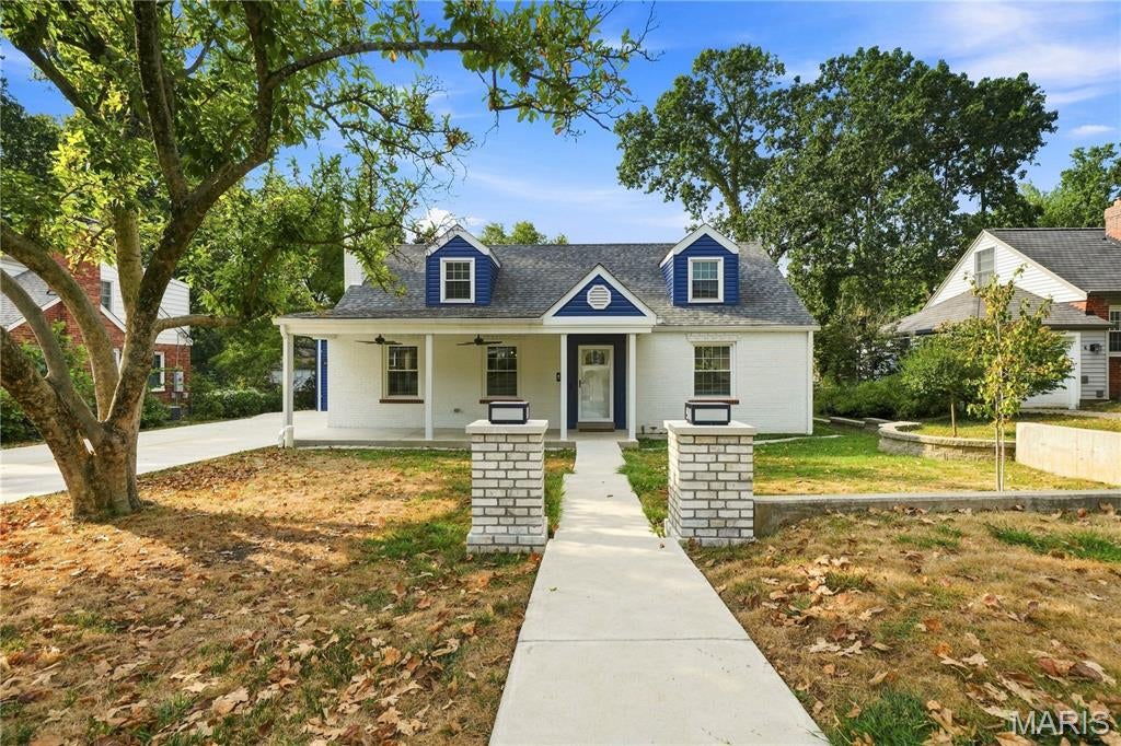 Thoughtfully reimagined from the ground up, 8 Villawood Lane beautifully blends the character of a classic Webster Groves home with the comfort and functionality of a comprehensive renovation. Every detail reflects careful planning, quality craftsmanship and respect for the home’s history. Original hardwood floors have been beautifully refinished, while wood from trees on the property was milled and repurposed throughout the home, adding warmth, character and a story all its own. The main level offers multiple inviting living spaces, a wood-burning fireplace, plus a bedroom and full bath providing wonderful flexibility for guests or a home office. Upstairs, the private primary suite is joined by two additional bedrooms and a full bath with a conveniently incorporated laundry area. The unfinished lower level offers abundant storage and includes an additional room with an egress window, providing possibilities for future use. An oversized one-car attached garage adds convenience. Situated on a lovely lot in the heart of Webster Groves, this 4-bedroom, 3-full-bath home is one that has been carefully considered, creatively reimagined and thoughtfully crafted for its next chapter.